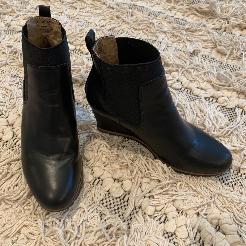 Black wedge booties